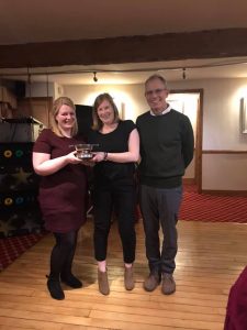 The Alison Baugh Memorial Trophy presented to Dawn Marshall and Mari Jones by David Baugh